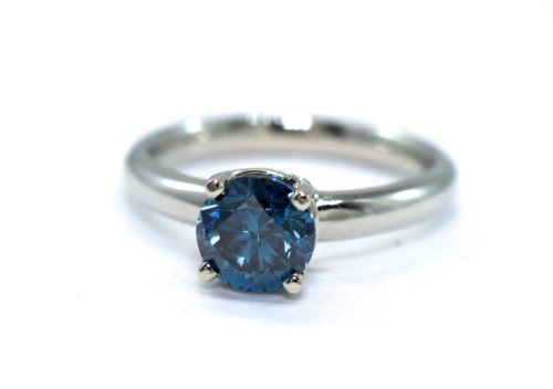 blue diamond solitaire engagement ring